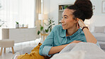 Black woman, relaxing by home office in morning start for freelancing business at home. African American female freelancer relaxing in the bedroom with positive mindset with freedom.