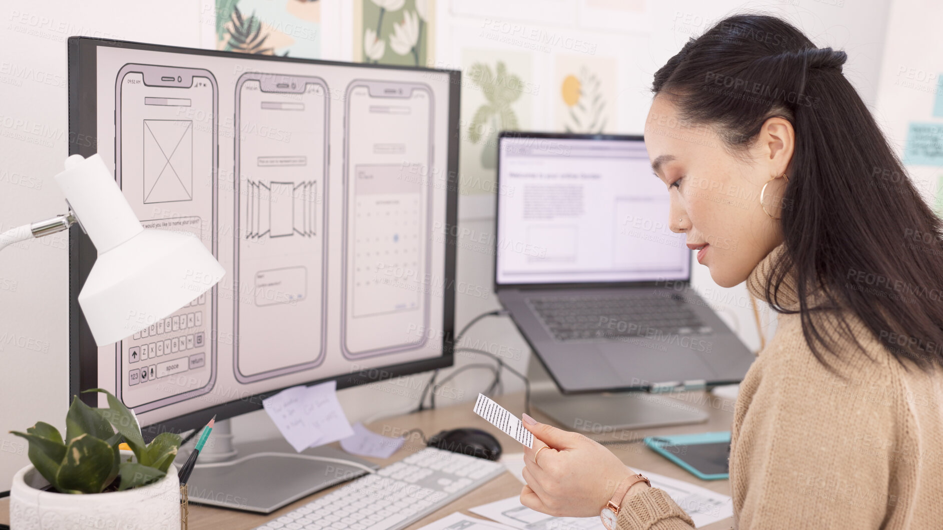 Buy stock photo Computer, phone hardware and a business asian woman at work in her office on technology development. Planning, creative and design with a young employee working on a graphic model of a mobile product