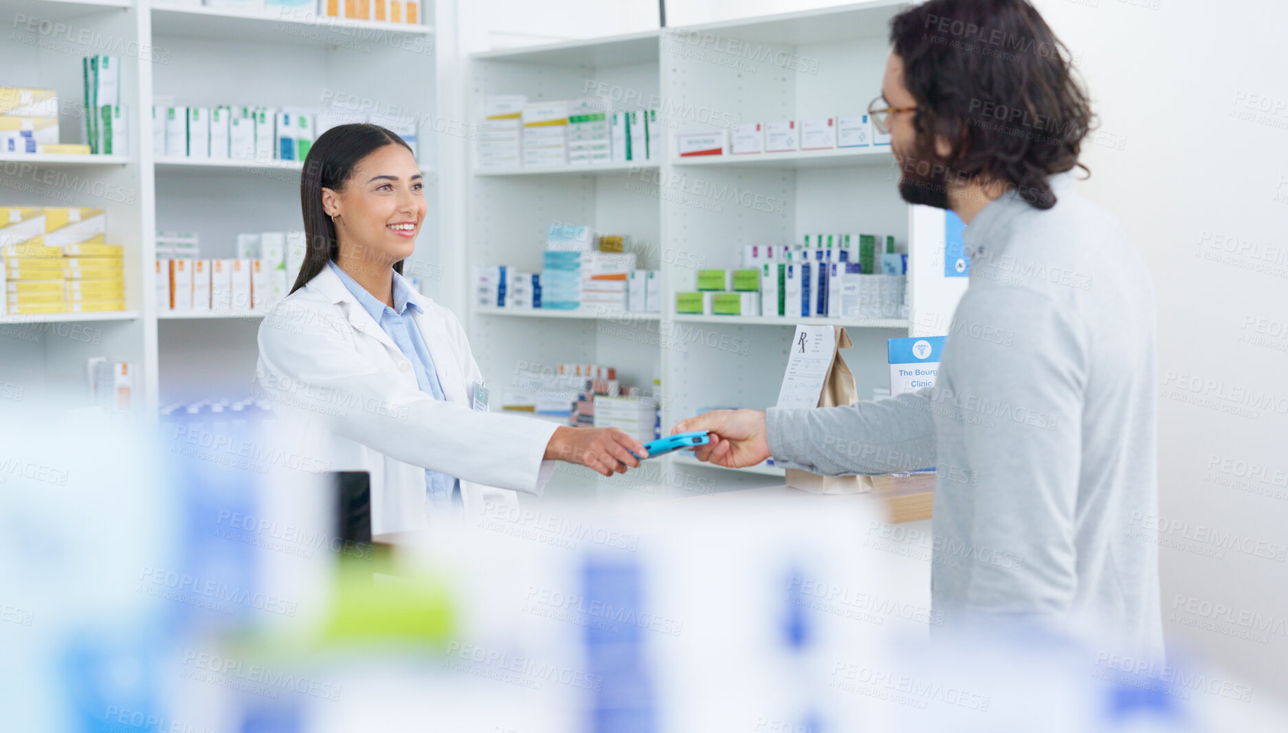 Buy stock photo Medication, healthcare and patient with pharmacist at a dispensary buying prescription treatment. Medical, transaction and female chemist helping man with payment for medicine in drugstore or clinic.