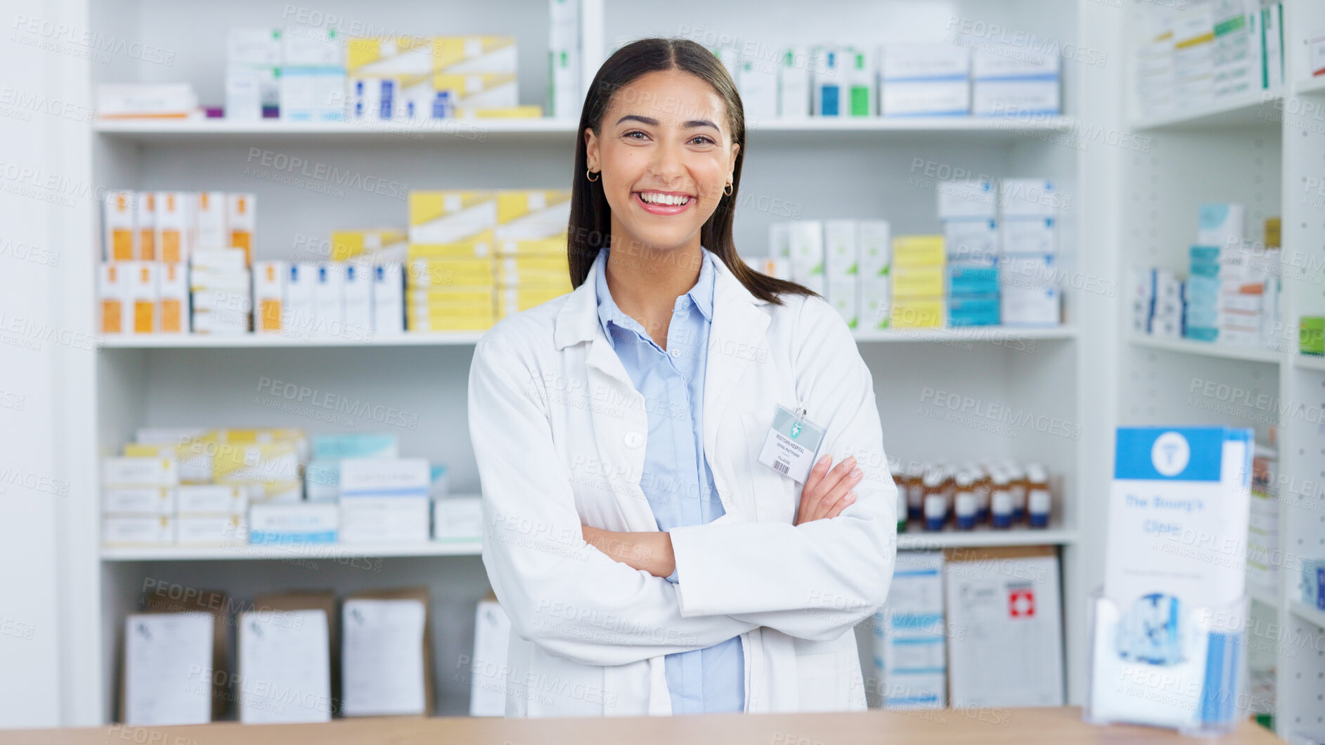 Buy stock photo Smile, crossed arms and portrait of woman pharmacist at dispensary with shelves of medication. Medical, happy and female chemist with confidence standing by medicine in pharmacy, drugstore or clinic.