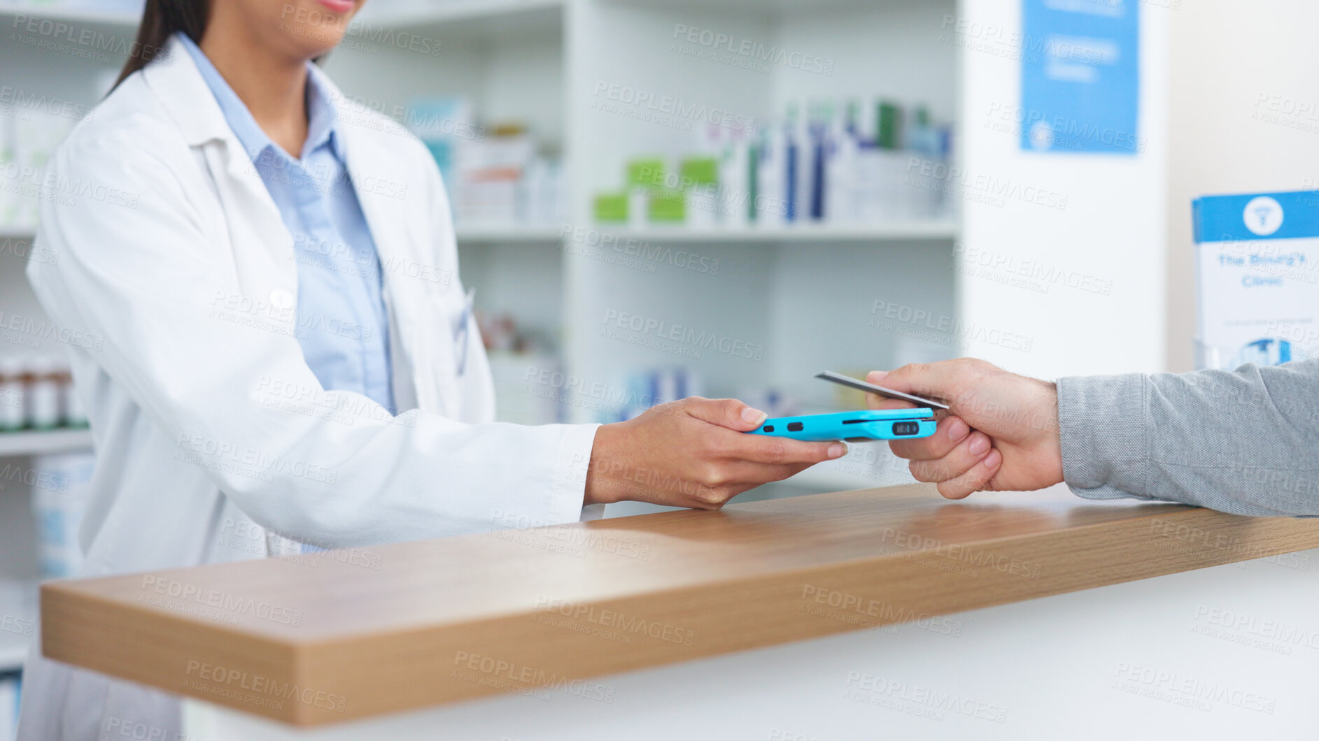 Buy stock photo Pharmacist, hands and credit card for payment at pos counter in drug store. Closeup, shopping and contactless purchase in pharmacy with cashier in financial transaction for medical sales or fintech