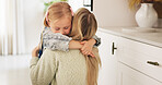 Hug, mother and child with love, care and smile to celebrate mothers day in their house. Young girl hugging her mom for affection, happiness and peace in the living room of their family home