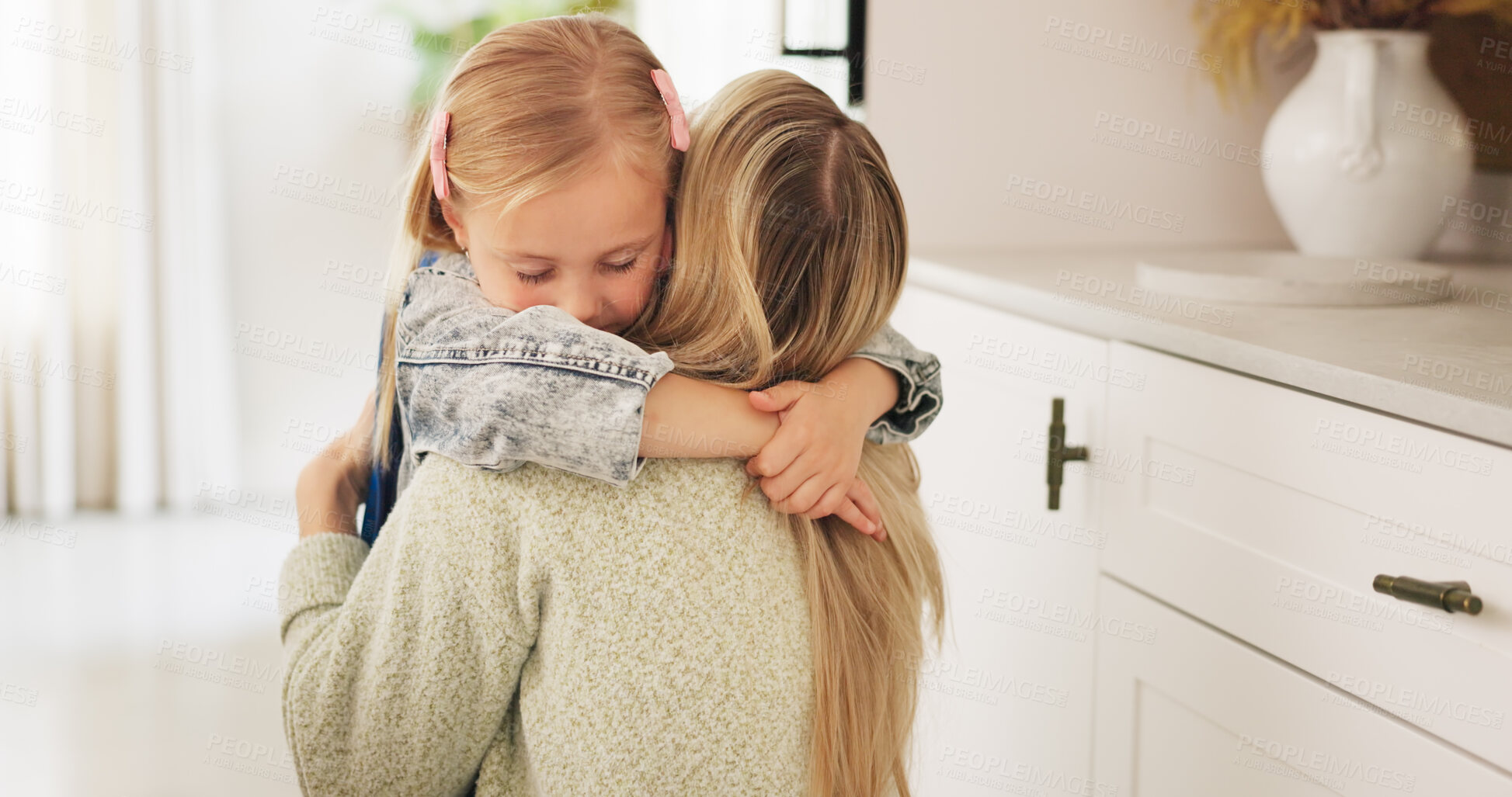 Buy stock photo Hug, mother and child with love, care and support to celebrate mothers day in a house. Young girl, happy embrace and mom with bonding, relax mama and kid together in a living room at family home