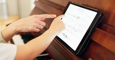 Girl, piano and tablet with teacher for learning, education or training with tech for music in home. Child, keyboard and mom for development, teaching and theory for art, harmony or time on web