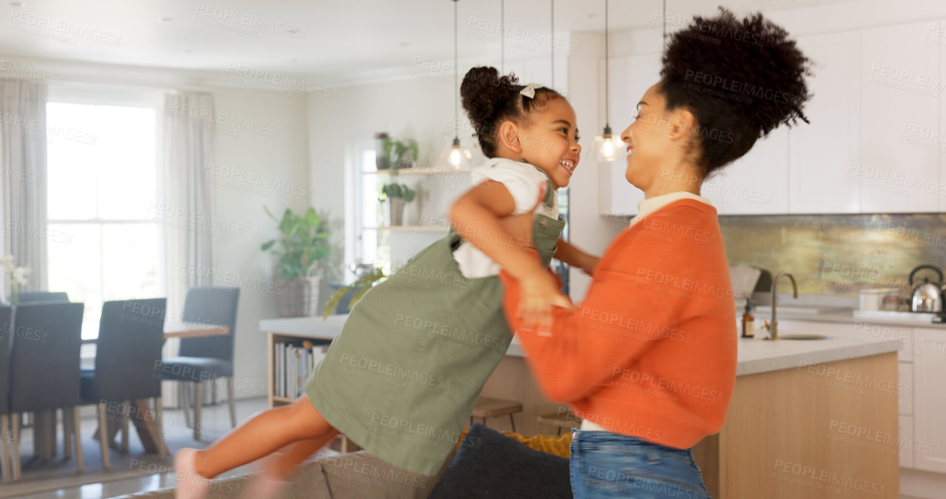 Buy stock photo Mom, child and spin in kitchen, happy and lift with playing games with love, bonding or care in house. Family home, mother and daughter with kindness, support and excited together with comic laughing