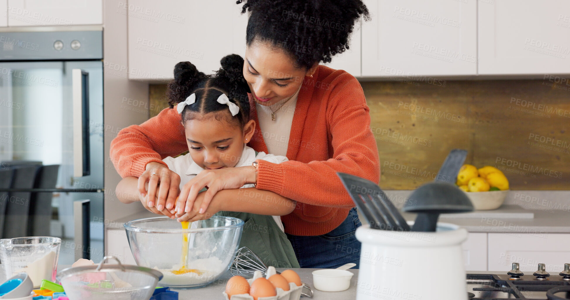 Buy stock photo Mother, child and baking with eggs in kitchen for family bonding, learning and fun with ingredients at home. Happy mom teaching young girl kid to bake, cooking and helping to make recipe for dessert