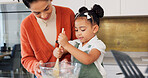 Cooking, kitchen and mother with child teaching, learning and working together for breakfast, cake or cookies in home development. Family mom and kid baking dessert with food, eggs, butter and flour