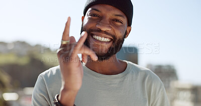 Buy stock photo Shaka, smile and portrait of black man in city outdoors on holiday, vacation and weekend. Face, fashion and person from South Africa with calling hand gesture, emoji and happy for trendy clothes