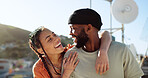 Interracial couple, hug and bonding on city building rooftop for summer holiday, travel vacation date and location break in Boston. Smile, happy black man and talking woman or student fashion friends