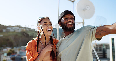 Buy stock photo Couple of friends, pointing and outdoor in city for fun adventure, interracial love and happiness. African man and trendy gen z woman excited together for travel, urban date and freedom or relax