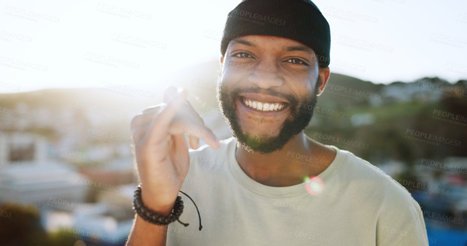 Buy stock photo Shaka, happy and portrait of black man in city outdoors on holiday, vacation and weekend. Face, fashion and person from South Africa with calling hand gesture, emoji and smile for trendy clothes