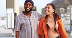 Comic, communication and interracial couple walking in the city, talking and on a date together. Happy, smile and black man and woman in a funny, comedy and crazy conversation while on a walk