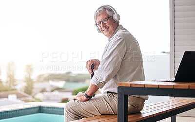 Buy stock photo Headphones, patio and portrait of senior man by pool in backyard for relaxing, chill and podcast. Retirement home, happy and elderly person listening to music, streaming song and audio in summer