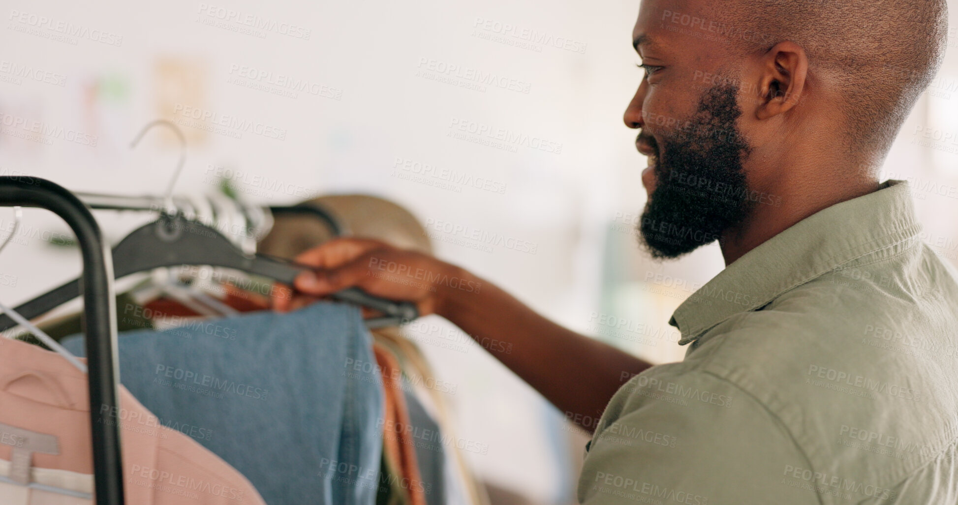 Buy stock photo Man designer, entrepreneur startup and clothes shopping rack in boutique and design studio. Happy worker, creative job and wardrobe of clothing, fashion and professional working in retail store