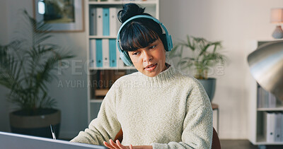 Business, creative and black woman with laptop, thinking and digital planning in modern office. Agent, African American female employee and consultant with focus, headphones and ideas for new project