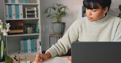 Business woman, typing on laptop and doing marketing research while writing an email or article online while sitting in a modern office. Creative entrepreneur using technology for communication
