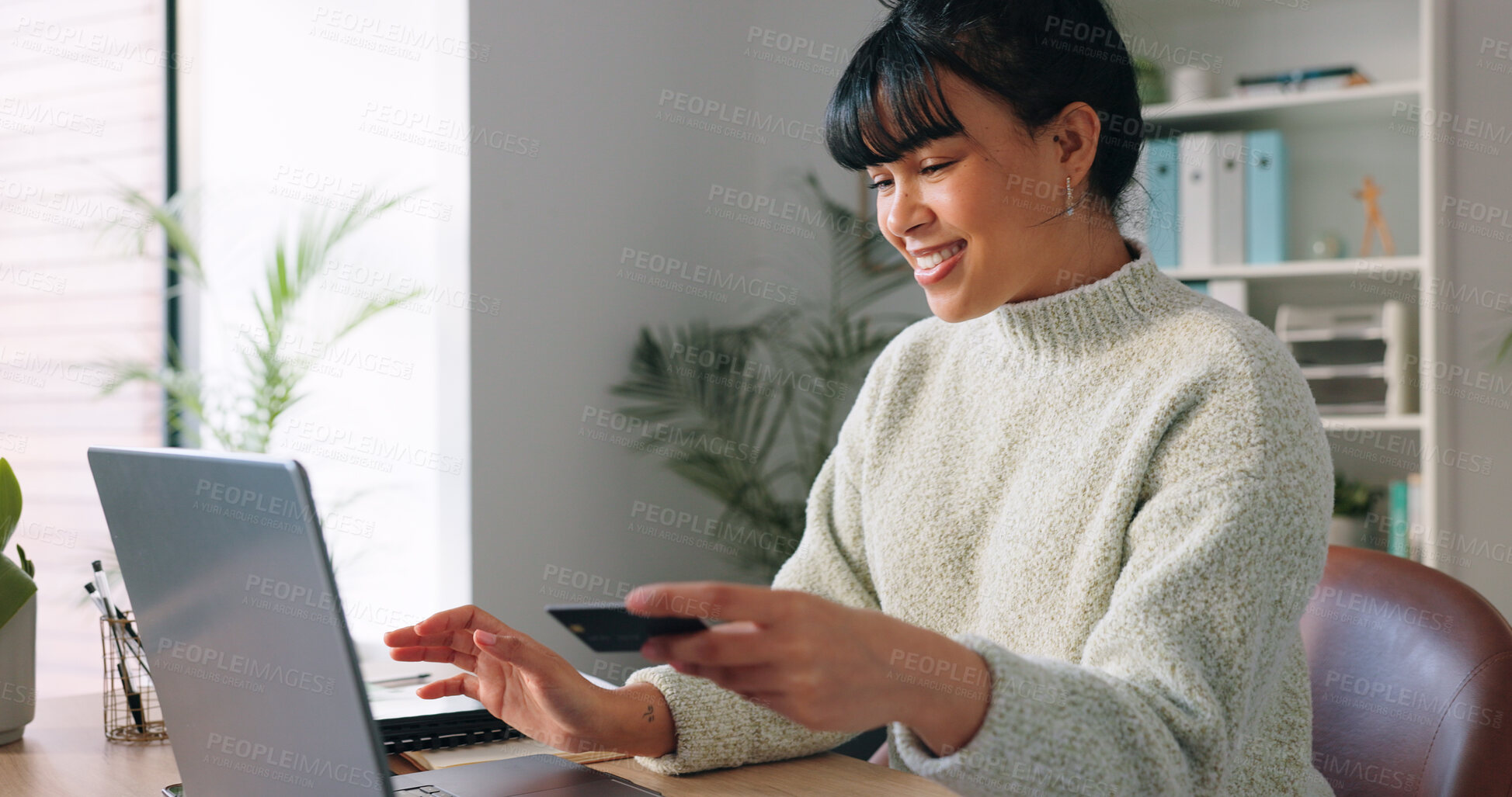 Buy stock photo Happy woman, credit card and laptop for online shopping, payment and e commerce in home office. Young freelancer typing on computer for internet banking, website subscription or loan application