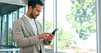 Businessman, phone and office with celebration, happiness and motivation for good news, winning or promotion. Man, smartphone and winner for esports, stock market or crypto profit on web app at work