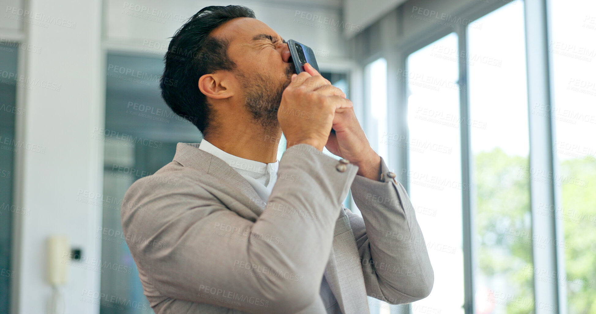 Buy stock photo Phone, kiss and a winner business man in an office for celebration of a deal, growth or stock market target. Wow, goals and good news with a young employee happy for success, sales or a bonus