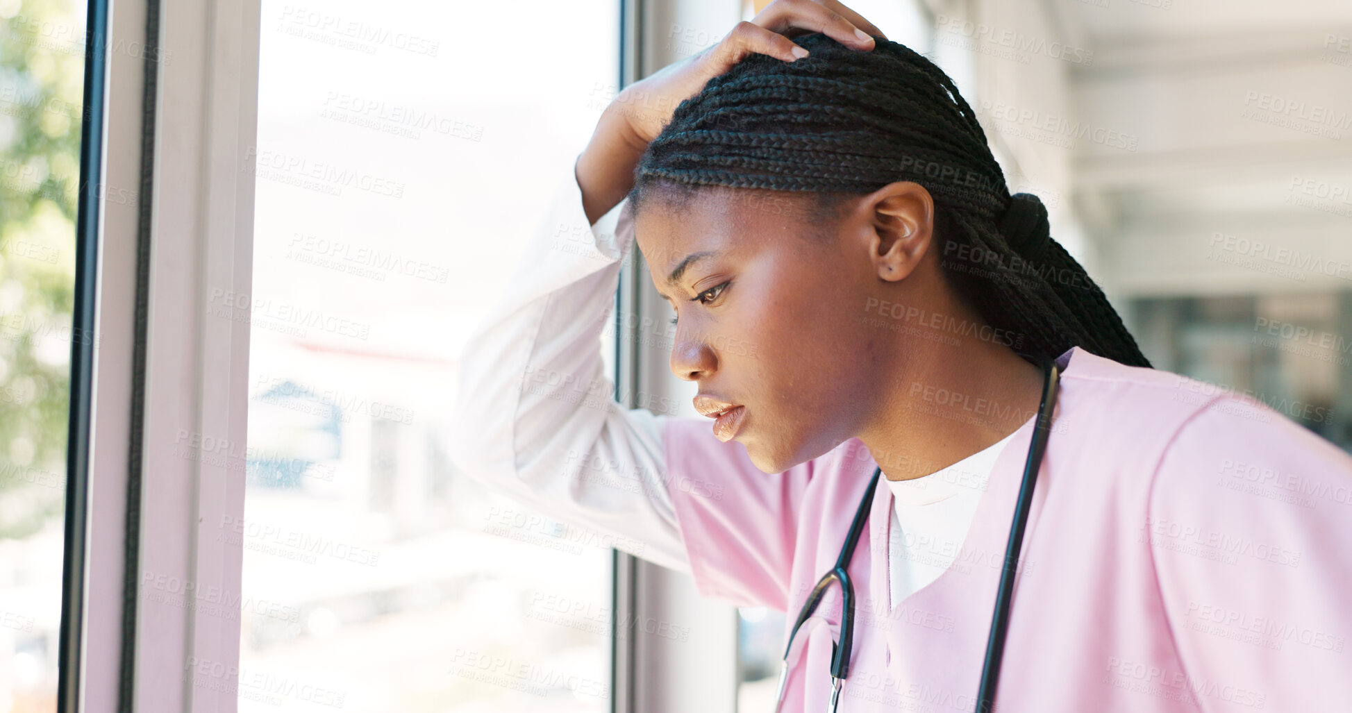 Buy stock photo Stress, doctor and black woman thinking with mental health at a window breathing through panic attack, anxiety or mistake. Hospital, burnout and African nurse with headache, vertigo or fail trauma