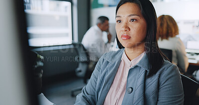 Business, asian woman and focus on typing, computer and online schedule in modern office. African American female, administrator and employee with concentration, corporate planning and professional
