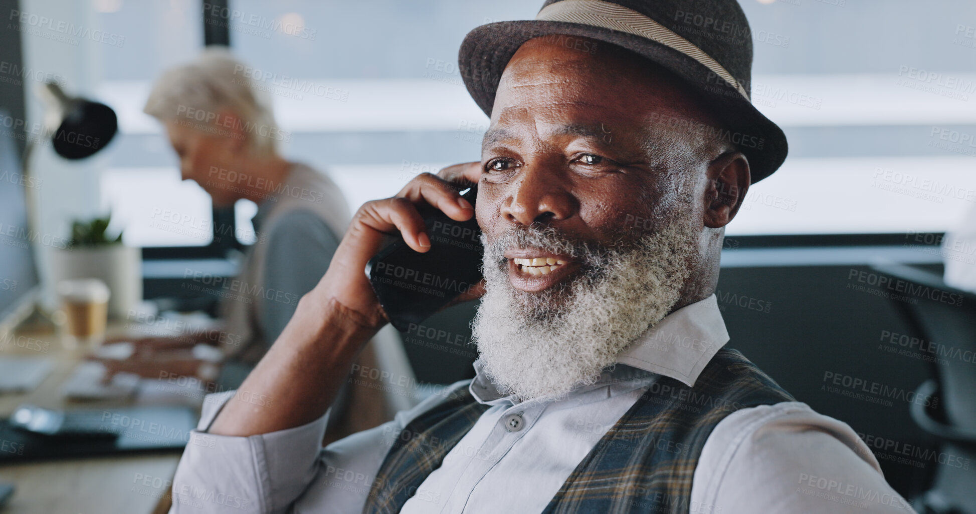 Buy stock photo Mature man, talking and phone in office, business and startup by professional, corporate and entrepreneur. Black businessman, smile and communication at job, motivated and happy on hearing good news