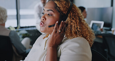 Crm, call center or black woman consulting via microphone talking, communication or helping online clients at help desk. Contact us, customer services or telemarketing sales agent in conversation