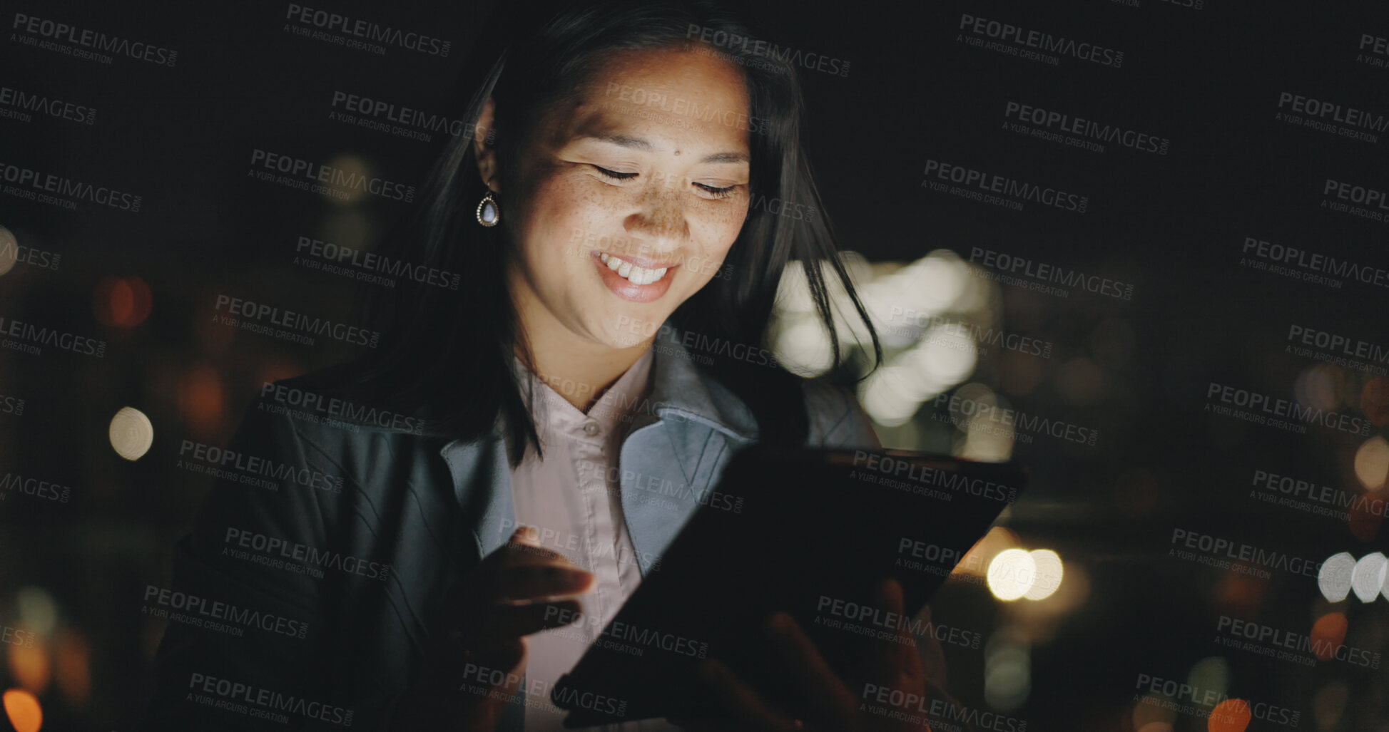 Buy stock photo Tablet, night and research with a business asian woman on an office balcony for planning or overtime. Technology, networking and a happy young employee working late in the evening on a project