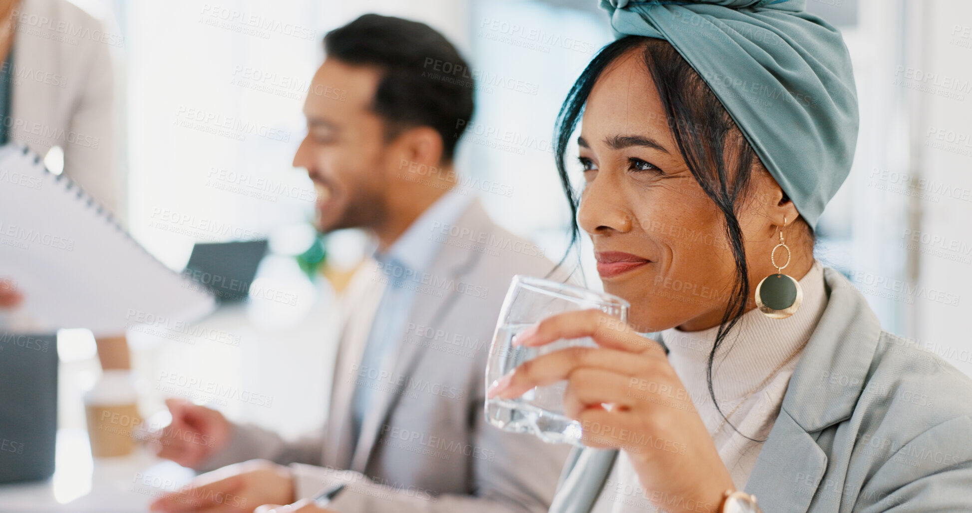 Buy stock photo Business woman, drinking water and smile on face in corporate, meeting and planning a collaboration with team. Employee, entrepreneur and thinking about idea, happiness and training in workshop