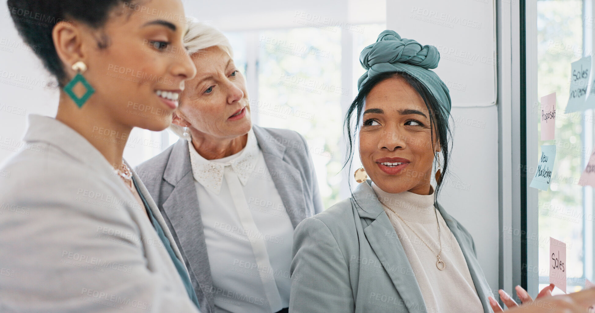 Buy stock photo Teamwork, planning and collaboration of business people in company for sales strategy in office. Sticky notes idea, glass board and group of women working together on management project in meeting