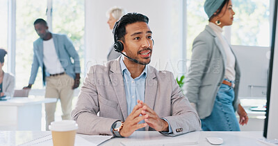 Customer service, call center and man consulting in office workplace. Crm, customer support and telemarketing worker, sales agent or happy male consultant talking, networking or communication at desk