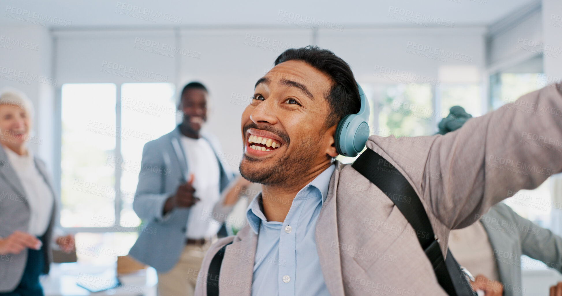Buy stock photo Music, dance and motivation with a businessman walking in an office while feeling positive or carefree. Success, happy or smile with a male employee arriving at work in headphones with audio
