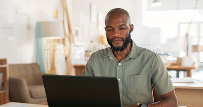 Email, phone and businessman working, planning and in communication with people on the internet at work. African manager, worker or employee typing on a laptop and reading on a mobile in an office