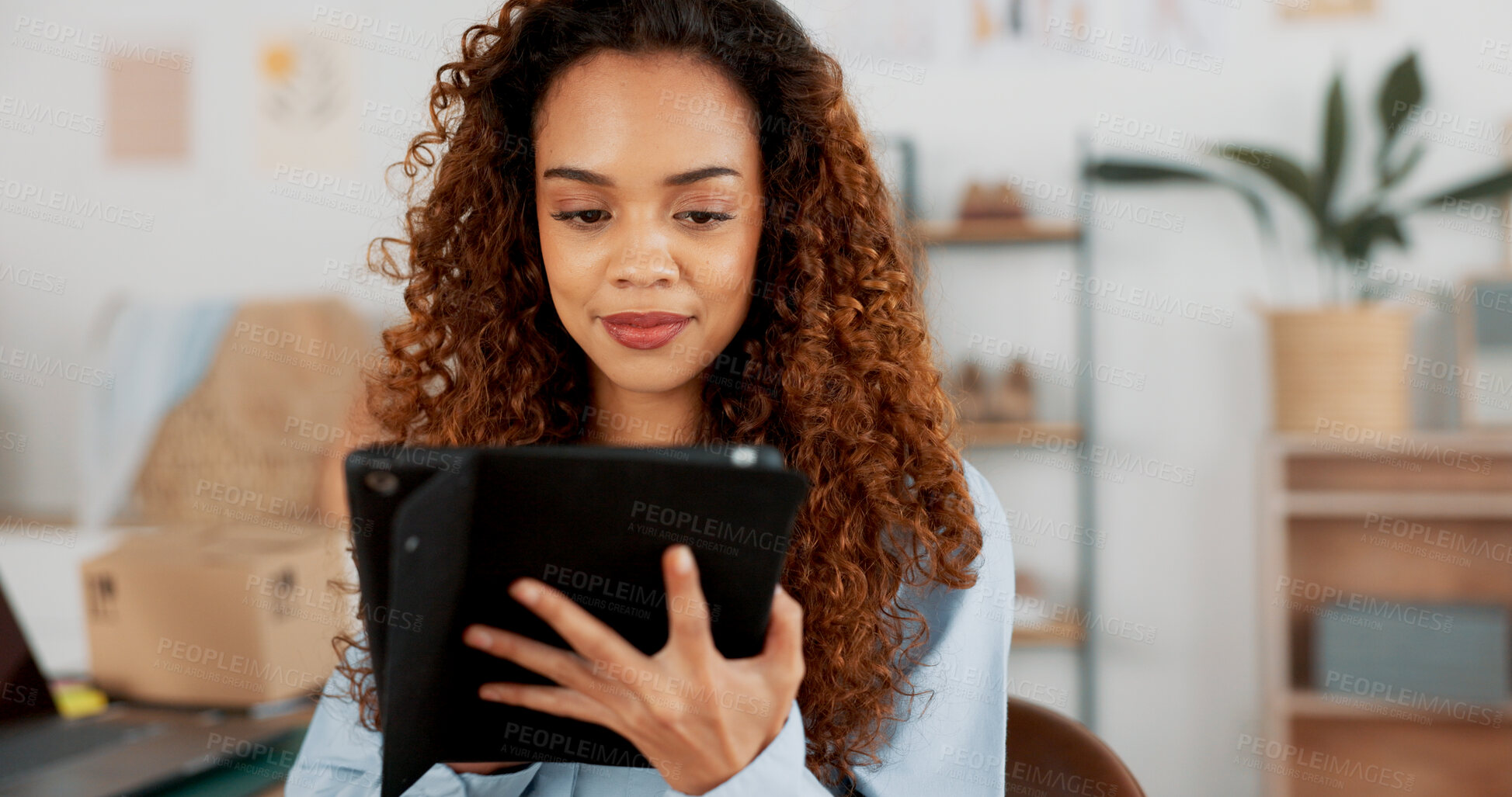 Buy stock photo Tablet, online order and design with a black woman in the office for planning, strategy or creative research. Technology, information and a young employee or small business owner in a workplace