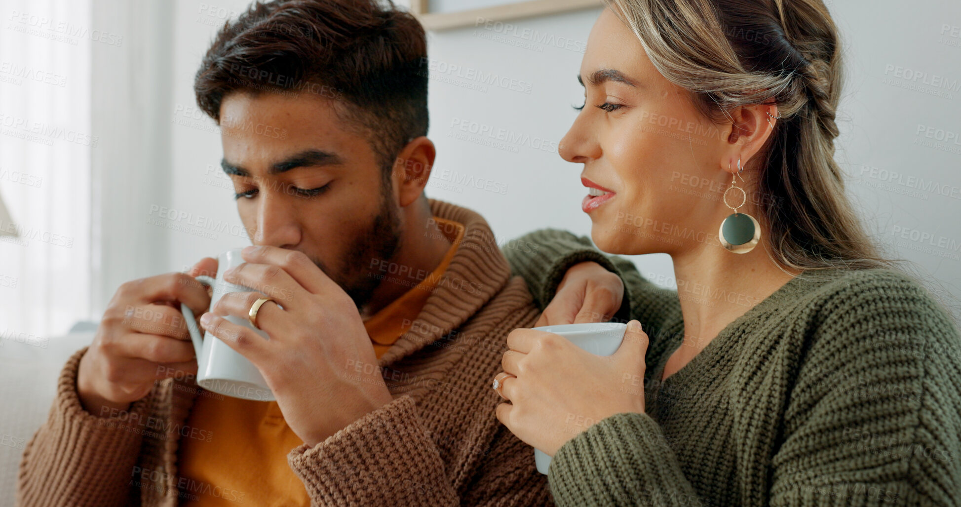 Buy stock photo Love, coffee and couple in living room relax with conversation, bond or communication at home. Romance, care and man with woman in lounge with tea, speaking or share gossip, chill or day off in house