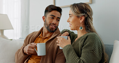 Movie, coffee and couple watching tv or streaming an online series via a subscription for fun entertainment at home. Relaxing, smile and happy woman enjoying a film together on a sofa with partner