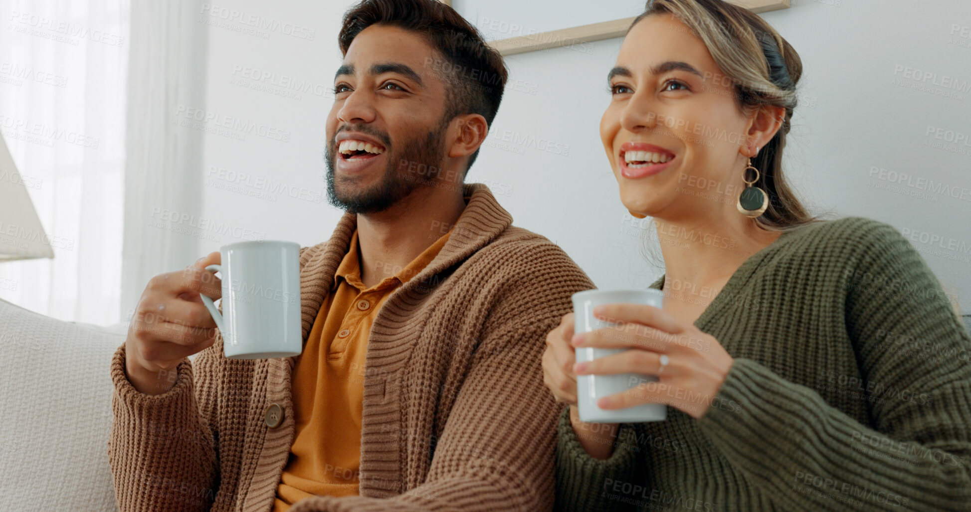 Buy stock photo Smile, coffee and a couple watching tv in the living room together for streaming in the morning. Love, relax or happy with a man and woman on a sofa at home for bonding or subscription entertainment