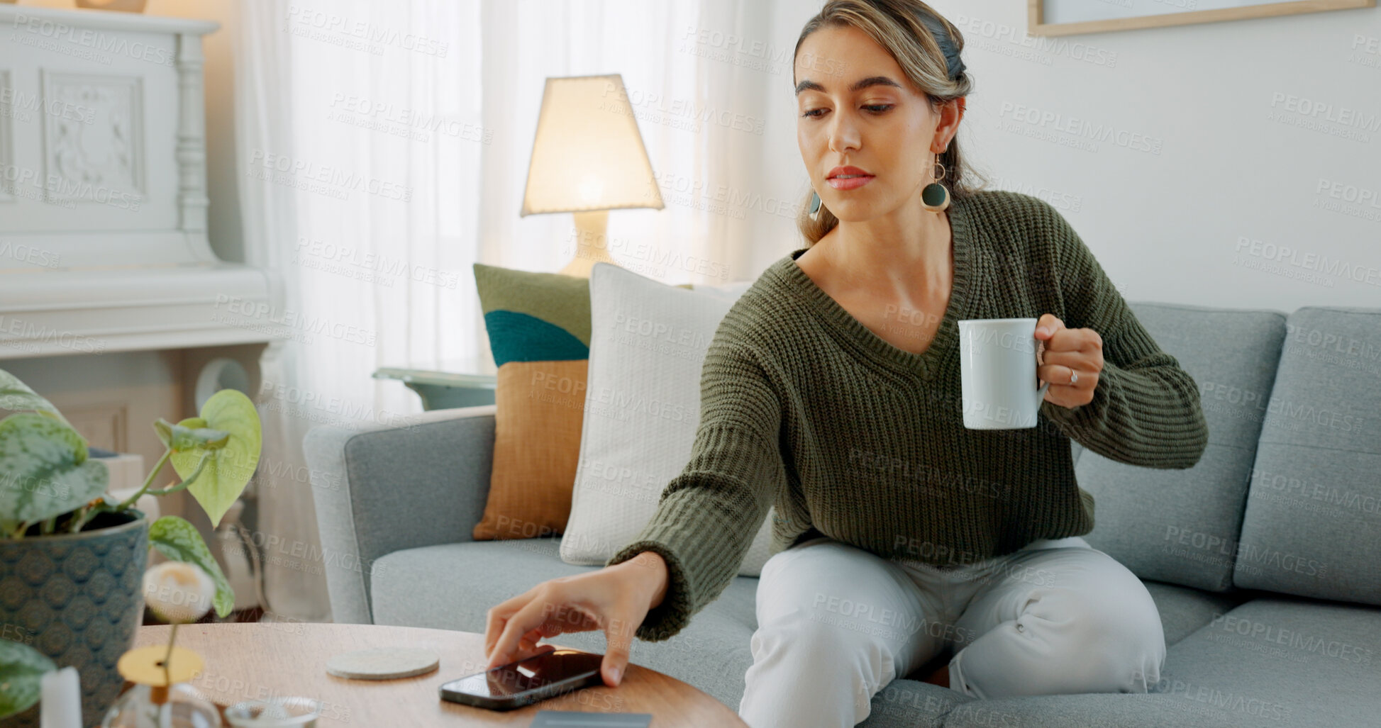 Buy stock photo Woman on sofa with phone, relax and coffee for social media, call or chat online in home. Smartphone, drink and girl on couch with mobile app, peace and calm for internet, connection or networking.