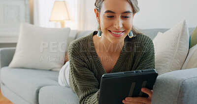Woman, digital tablet and living room app, typing and reading ebook, online shopping and 5g multimedia technology on sofa home lounge. Relax girl on social media, internet website and wifi connection
