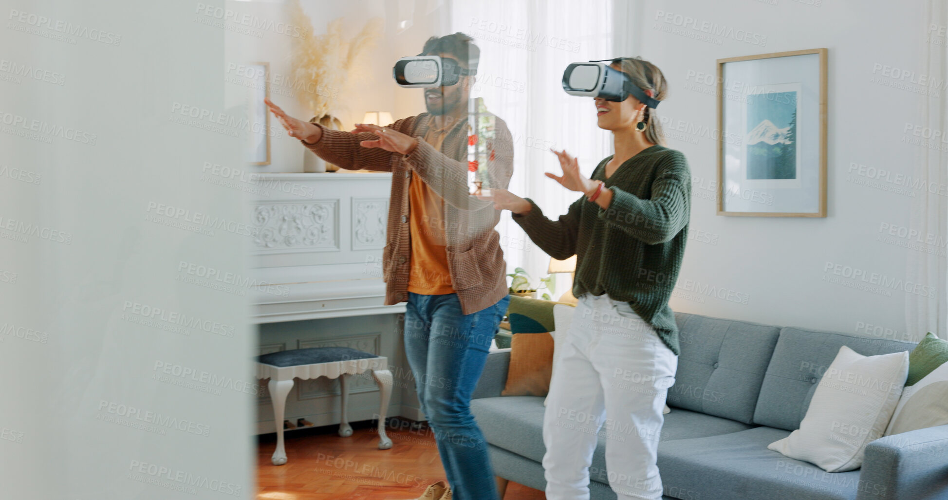 Buy stock photo Virtual reality simulation, home and couple play cyber video game, future technology and multimedia system, software or AI. VR goggles, futuristic gamer and people gaming on interactive digital world