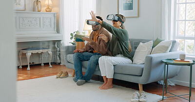 Vr, virtual reality metaverse and couple on sofa in living room home exploring a virtual world, ai or cyber game. 3d future app, diversity and tech gaming man and woman playing software video games.