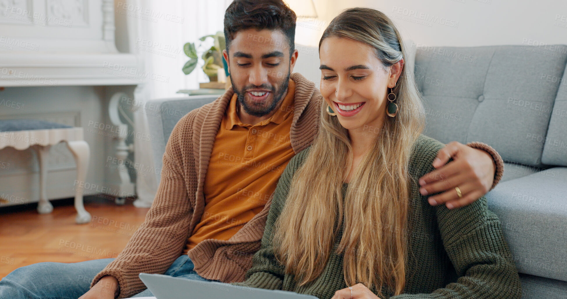 Buy stock photo Couple, planning and love with laptop at home for vacation, holiday or browsing in happiness. Married, multicultural, and together with technology for conversation, bond and relaxing in living room