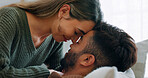 Interracial, couple, love and kiss being happy, bonding and embrace for communication, talking together and at home. Romantic, man and woman with smile, intimate and being loving for romance or hug