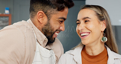Young couple in kitchen, people cooking in Mexico apartment and comic Indian man joke with girlfriend\'s smile. Face of happy latino woman talking, bonding on home date and love funny time together