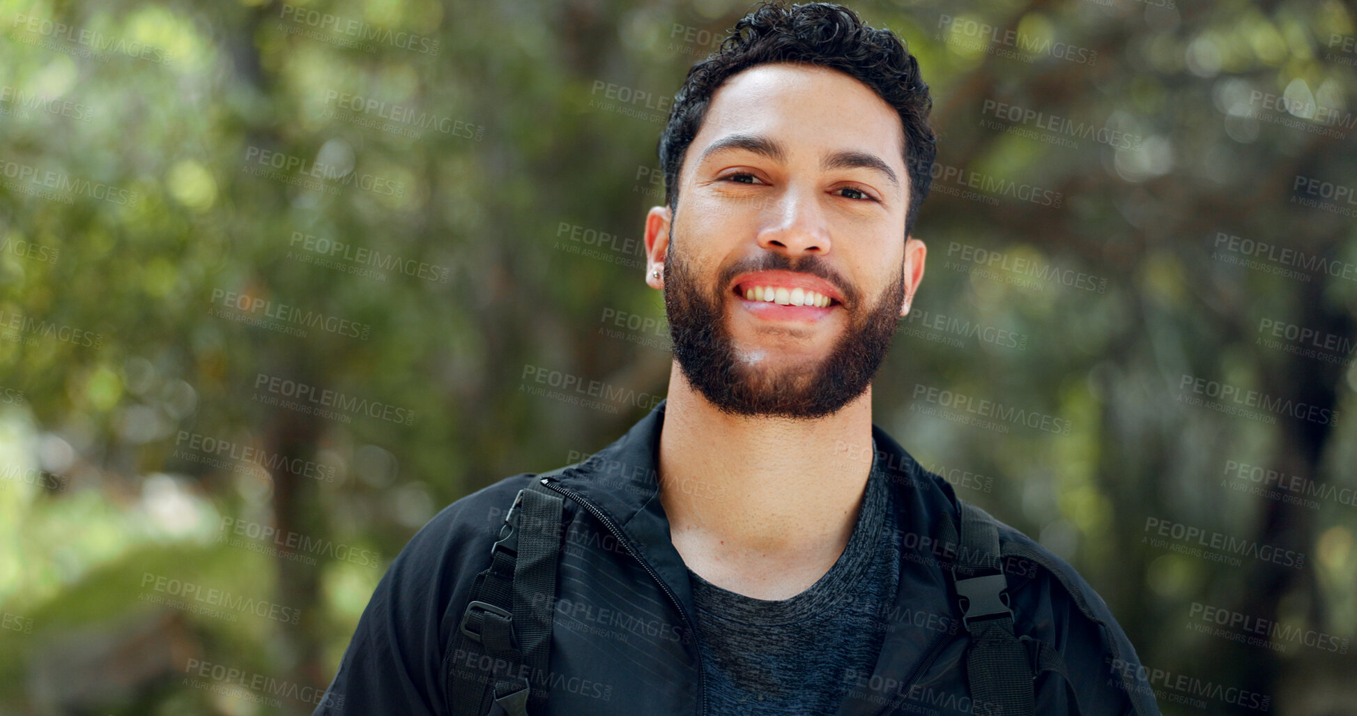 Buy stock photo Fitness, hiking and portrait of happy man in forest, commitment and confidence in outdoor adventure and sports. Face of athlete in woods, trekking challenge or training workout in nature with smile.