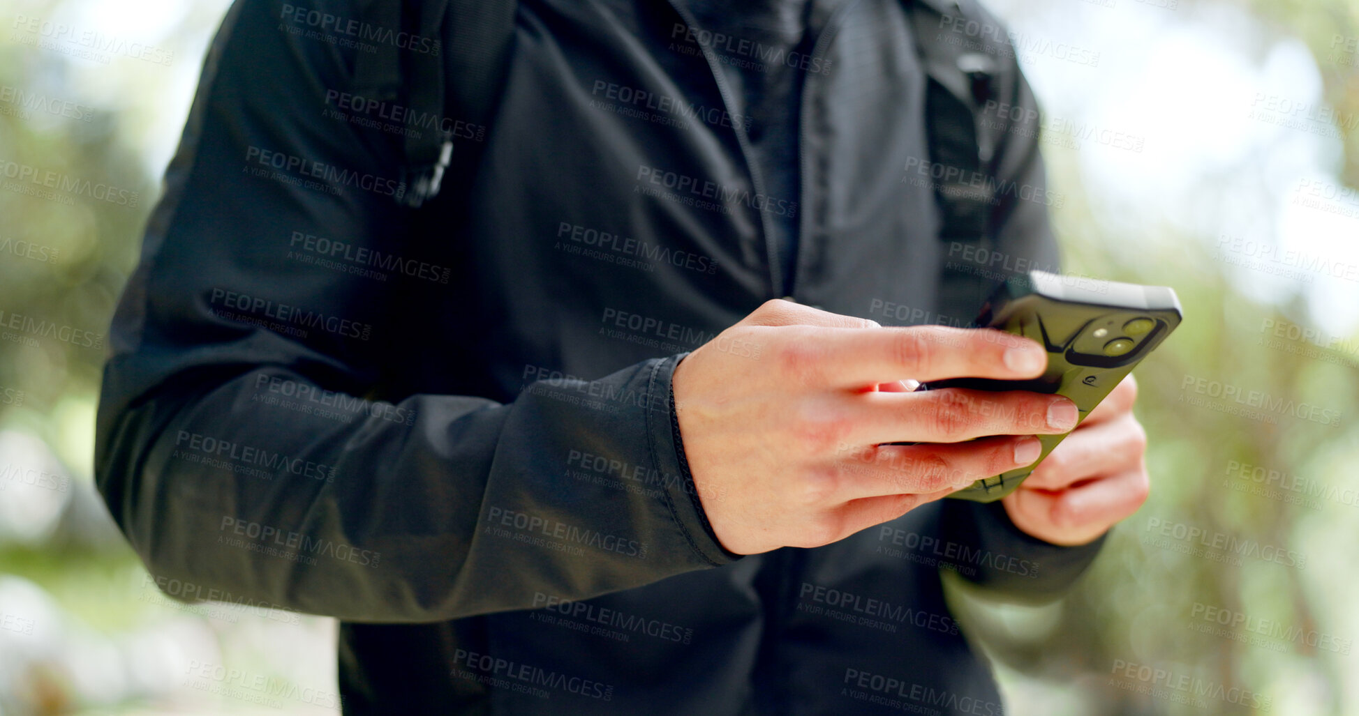 Buy stock photo Fitness, phone and hands on man in a park for training, exercise or cardio run closeup. Smartphone, zoom and male runner zoom online for location, map or sports wellness app, social media or search