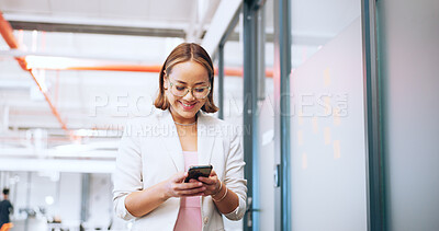 Business woman, office phone and communication of a employee walking with a smile. Corporate worker on technology for social media, web and internet scroll at work with happy texting on a break