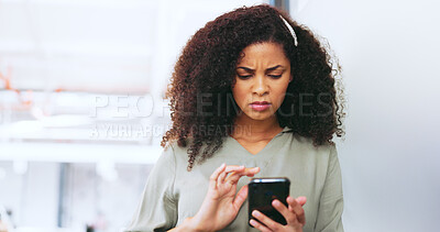 Phone, black woman and frustrated frown of a person on digital communication reading fake news. Annoyed woman on web, internet and social media scroll confused about digital media reading in a office