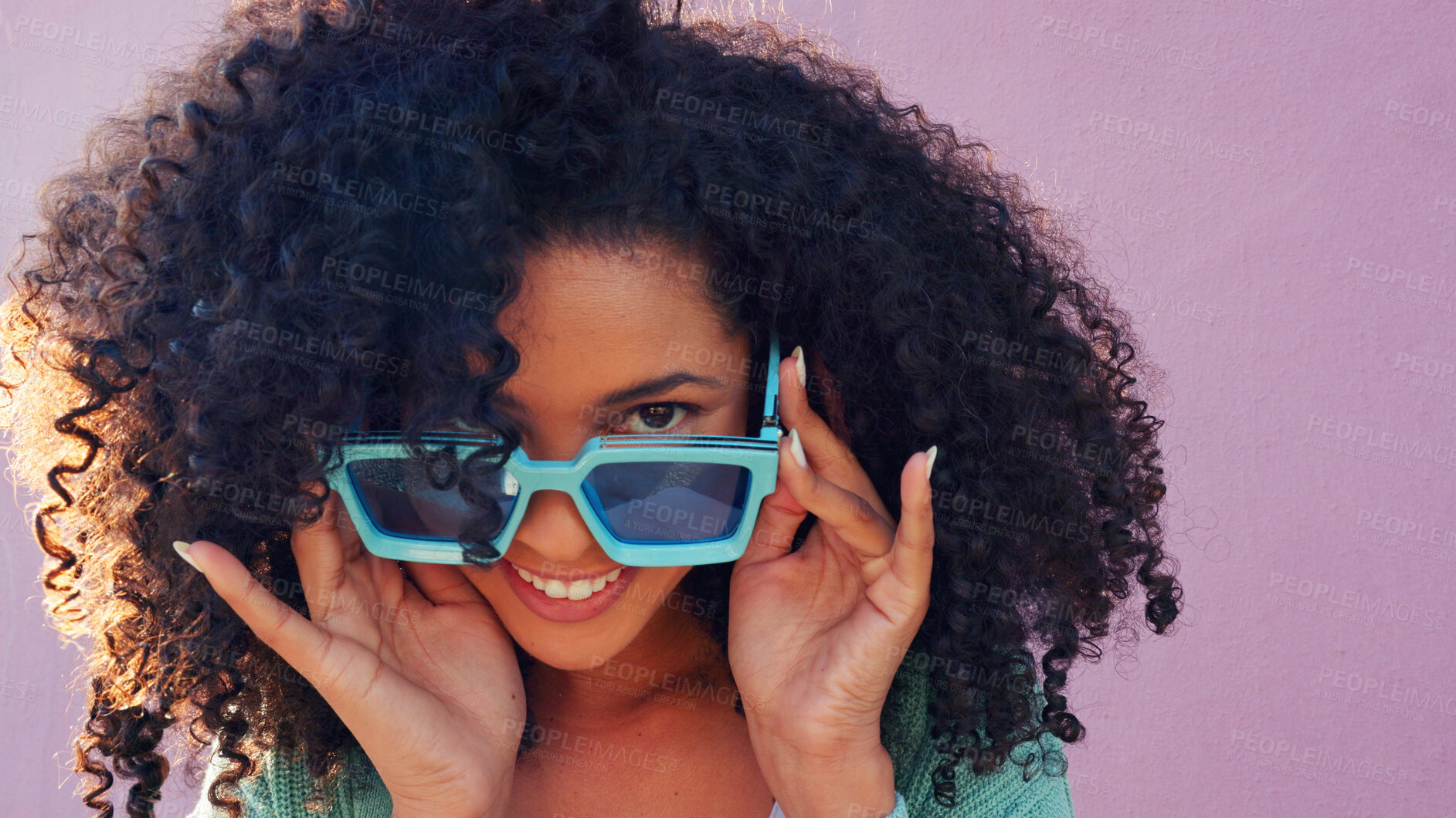 Buy stock photo Black woman, natural hair and happy portrait with smile on pink background  by wall with freedom. Fashion, fun and trendy sunglasses with outfit of person with afro hairstyle outdoor with fresh look