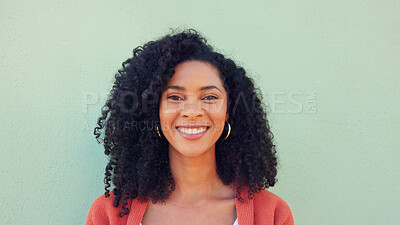 City green wall, hair care face and woman on travel holiday, smile for urban town and comic joke on the weekend on vacation. Portrait of beautiful, trendy and happy African girl in happiness downtown